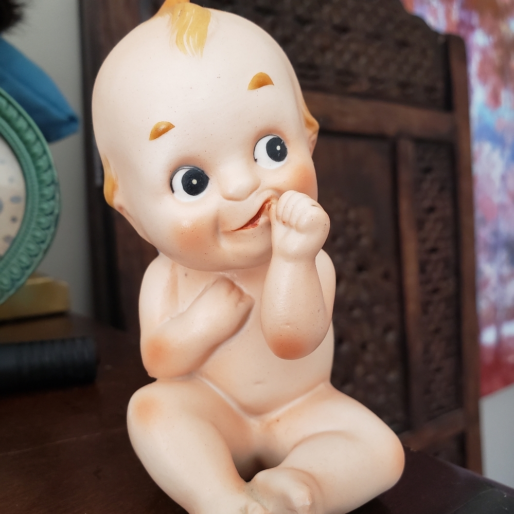 Kewpie figurine baby doll